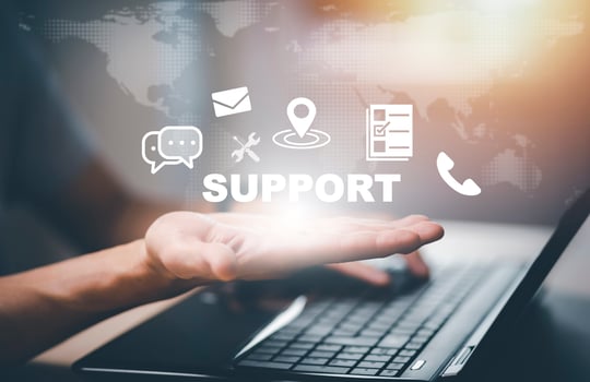 Communication and Contact us or Customer support hotline people connect. Hand using a laptop and touching on virtual screen contact icons, email and address, live chat with internet wifi. photo