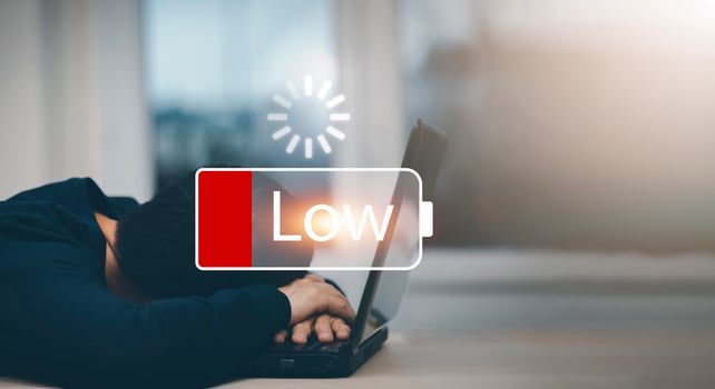 Businessman pressing button Low battery of energy with people icon concept, Saving on working with empty battery symbol,Tired from work and stress concept, Empowering ideas and teamwork photo