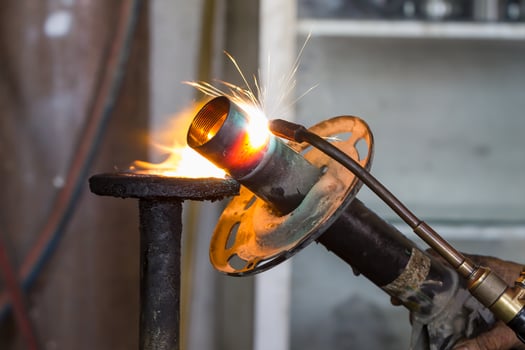Welders were repairing Shock absorbers photo