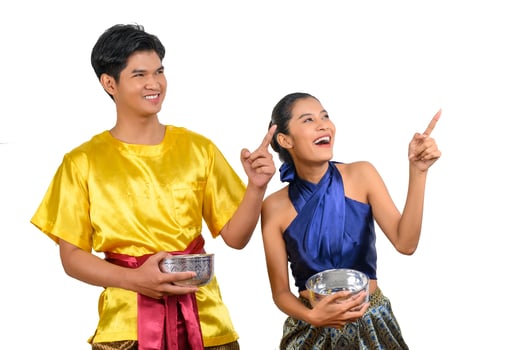 Young couple enjoy with water bowl on Songkran festival photo