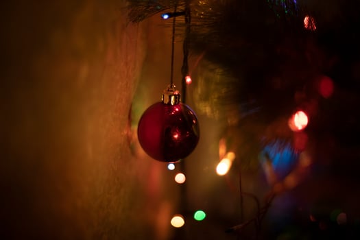 Christmas decorations on Christmas tree. Garlands of house. Cozy atmosphere. photo