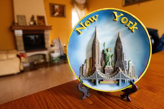 New York souvenir plate on a stand at home. photo