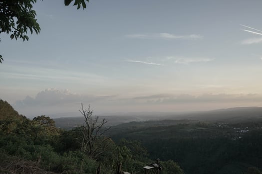 landscape portrait as the sun rises from the mountains. photo