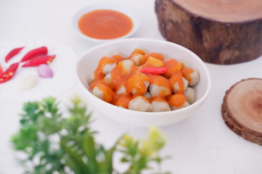 small meatballs with sauce as a background photo