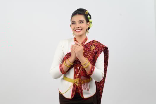 Portrait of Beautiful Thai Woman in Traditional Clothing shy Posing photo