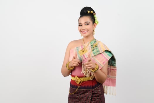 Young beautiful woman dress local culture in norteasthern point finger posture photo