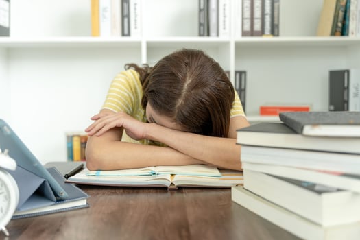Asian student woman have anxiety because of exams, female prepare for test and learning lessons in the library. stress, despair, haste, misunderstanding reading, discouraged, expectation, knowledge photo