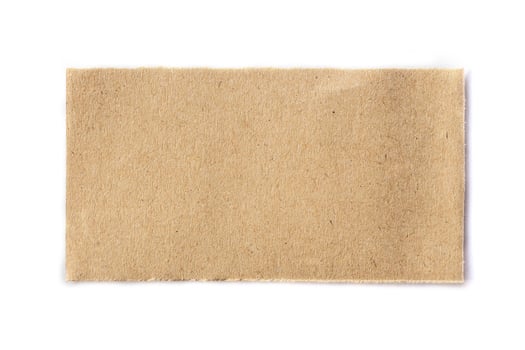 brown piece of ripped newspaper on white background photo