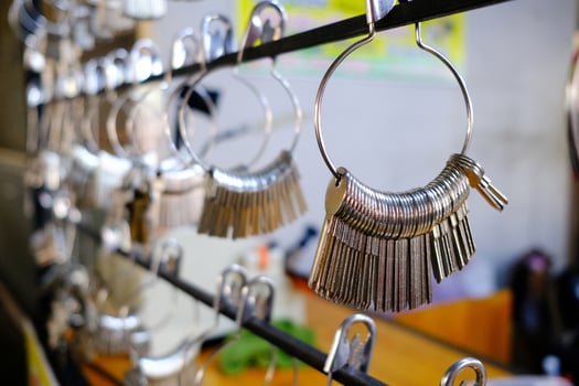 Close up Hanging New Key at Locksmith Shop. photo