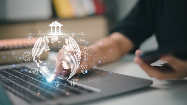Women use mobile phones and laptop computers for money transfers and currency exchanges between countries of the world. online banking interbank payment concept. photo