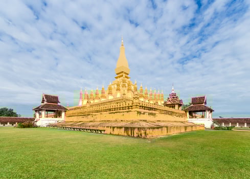golden pagoda wat Phra That Luang in Vientiane, Laos. photo