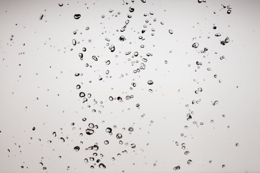 Falling water on a white background photo