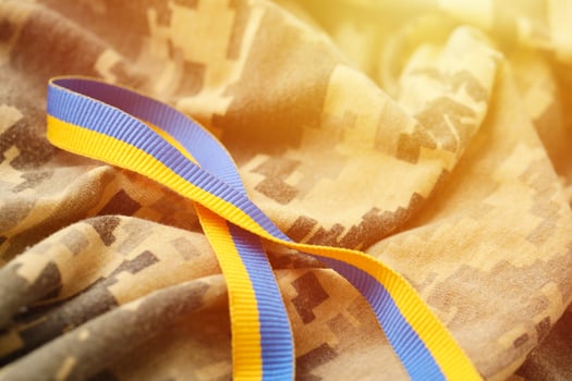 Pixeled digital military camouflage fabric with ribbon photo