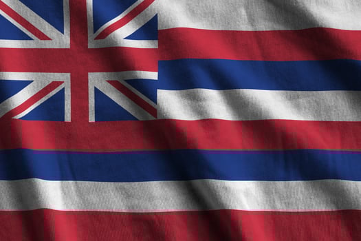 Hawaii US state flag with big folds waving close up under the studio light indoors. The official symbols and colors in banner photo