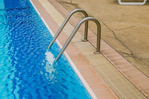 Swimming pool with stair at hotel. photo