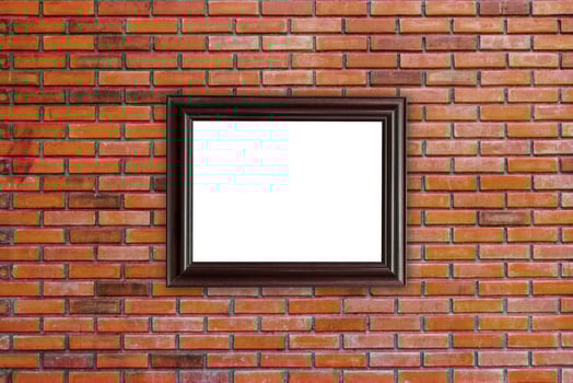 wood frames photo on red brick wall
