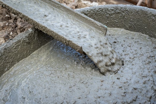 Pouring cement during for construction photo