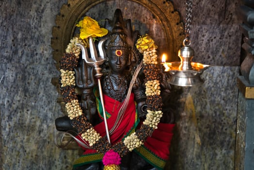 Hindu god in the Hindu temple in town Victoria on Mahe photo