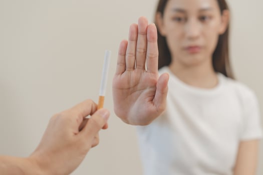 Quit, stop smoking, addiction asian young woman, girl refusing cigarette, smoker quitting smoke, hand in refuse, deny tobacco. Quit bad habit, health care concept. Willpower lifestyle of people. photo