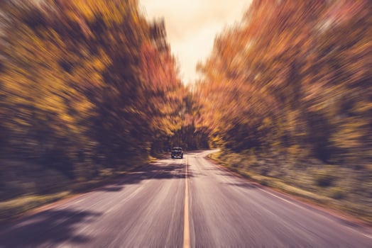 Country asphalt road in motion blur with vintage tone. photo
