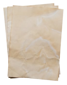 old paper on isolated white with clipping path photo