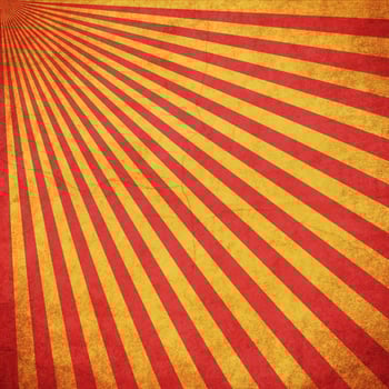 Red and Yellow grunge sunburst vintage background with space photo