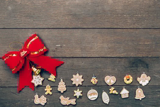 christmas decoration and red bow on wood background with copyspace. photo