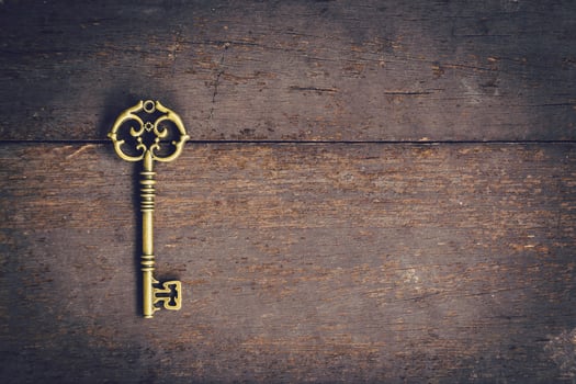 Old key vintage on wooden with space, Vintage filter. photo