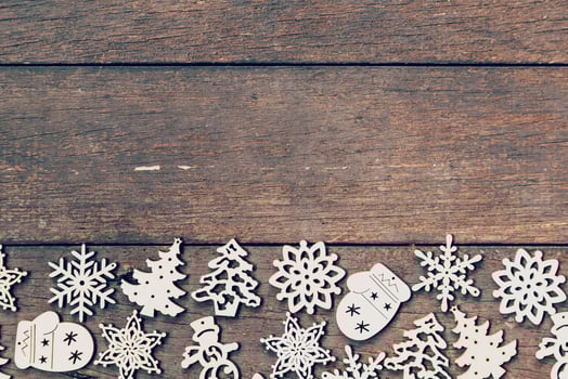 Wood christmas decoration on wood background with copyspace. photo