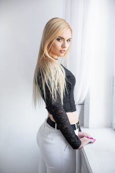 Young nice blonde posing in the studio photo