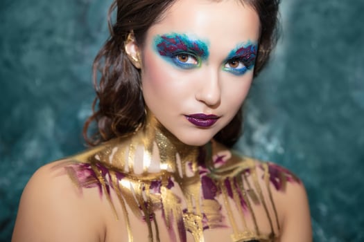 Young nice woman with creative make up photo