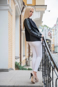 Lovely young lady posing standing photo