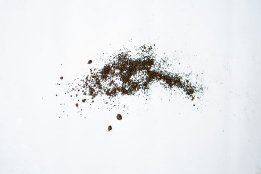 fertile soil particle isolated in white photo