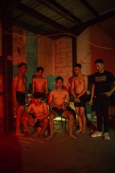 a group of adult men are having a reunion with their friends on new year's eve photo