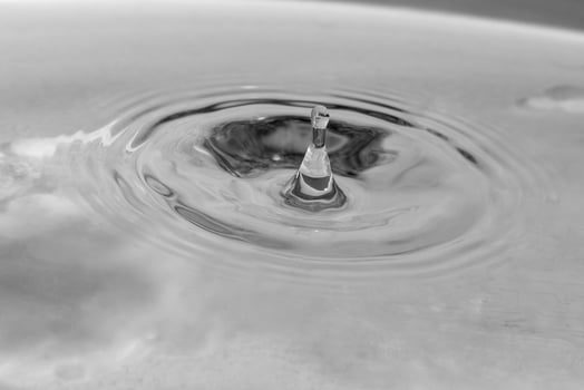 falling drops in water photo