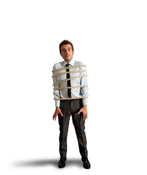 Businessman tied with rope photo