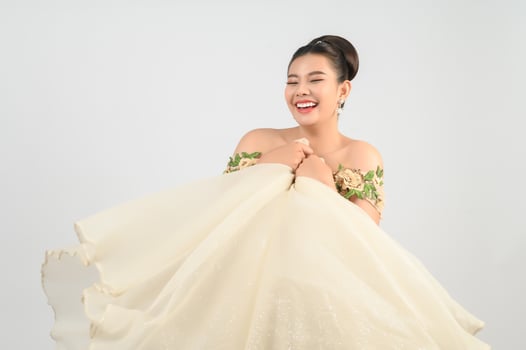 Young asian beautiful bride smiling with happy on white background photo