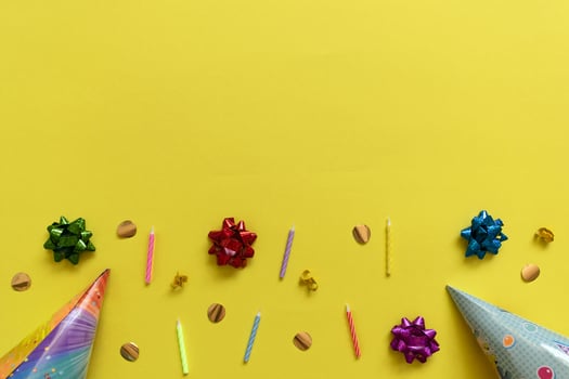 Birthday party decoration,candle,streamers,hat and gift boxes. Flat lay abstract background photo