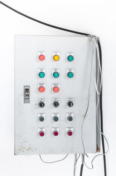 old Electric control  on white wall photo