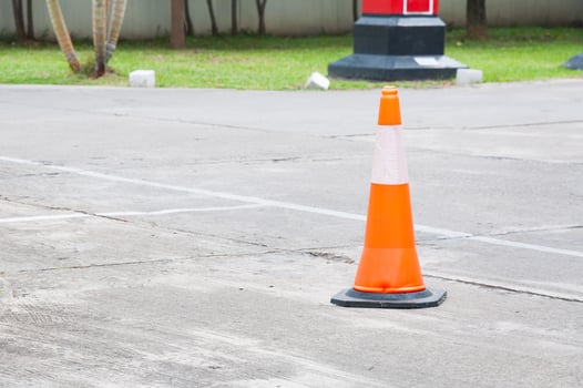 Traffic cone on the road photo