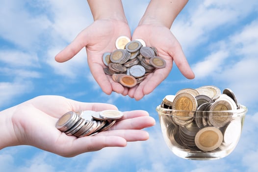 Coins in hands on blue sky,Donation Investment Fund Financial Support Charity  Dividend Market Growth Home House Stock Trust Wealthy Giving Planned Accounting Collection Debt Banking ROI concept photo