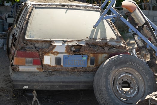 old abandoned car in junkyard in Baja California Sur Mexico photo
