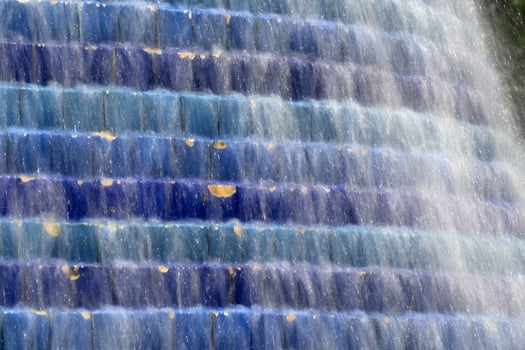 Water on tile mosaic fountain in Lisbon Expo photo