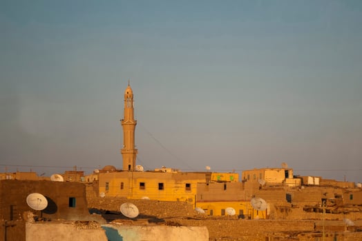 Egyptian settlement in Kings Valley with mosque tower photo