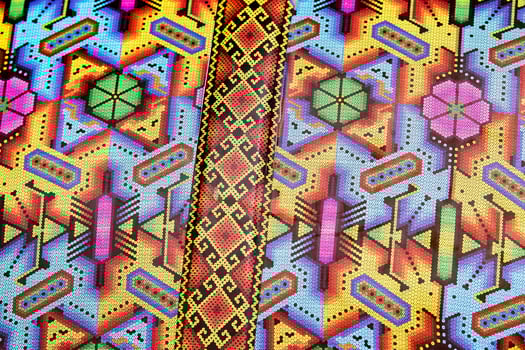 Different colors mexican fabric close up detail photo