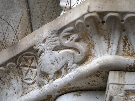 bas relief statue sculpture of church of riomaggiore cinque terre pictoresque village photo
