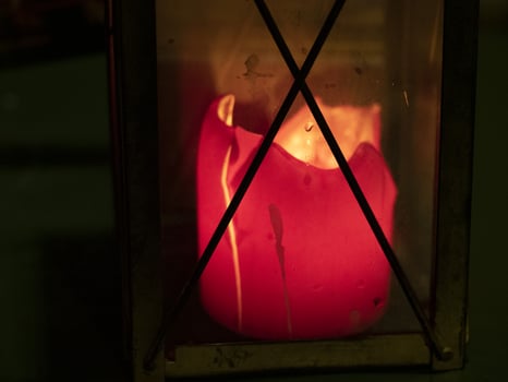 wax candle flame light on black photo