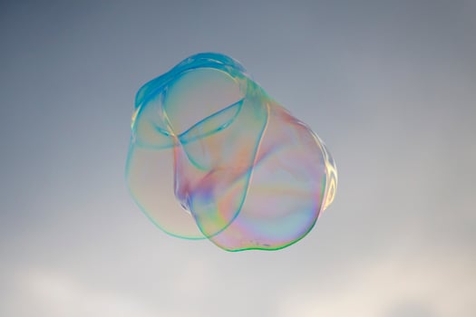 giant soap bubble rainbow colors photo