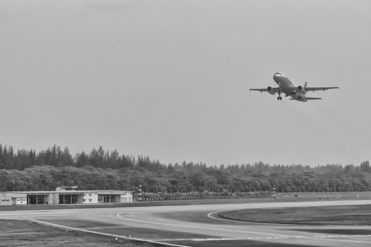 airplane while taking off in Changi Airport photo