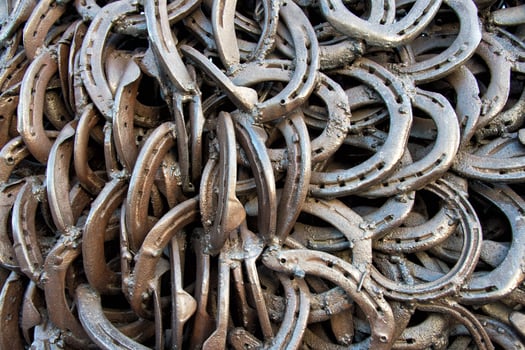 welded horseshoes texture close-up photo